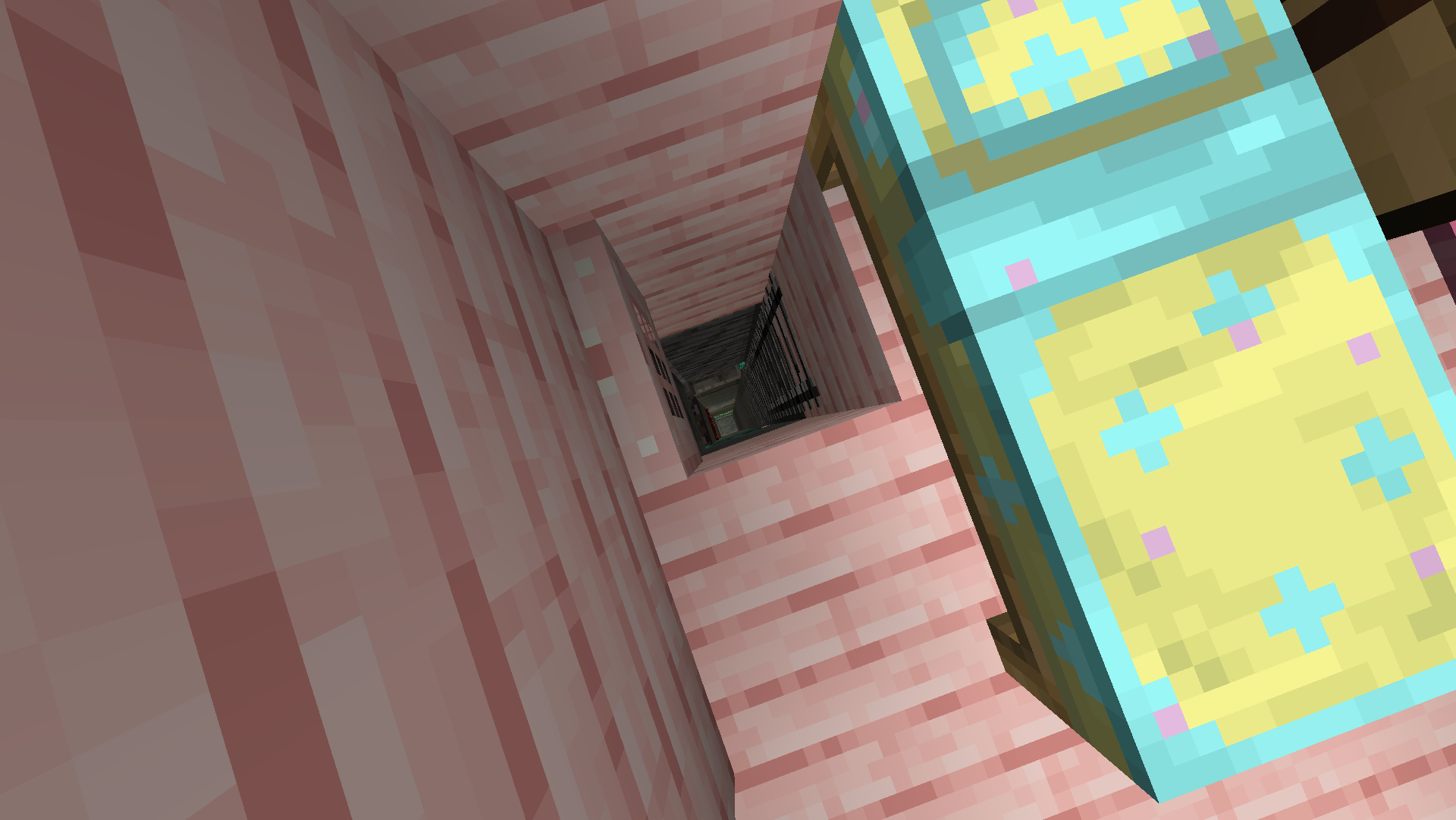 The open trapdoor showing a system of tunnels around a central ladder
