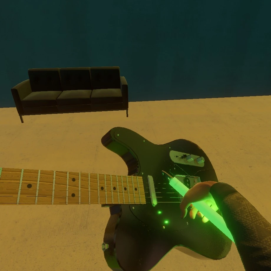 Picture of a guitar being played with a glowstick